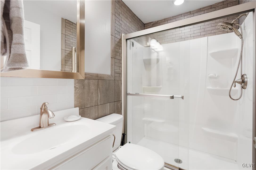 2229 Juniper Drive Coplay, PA 18037 - Photo 31 of 52 a bathroom with a sink and a mirror