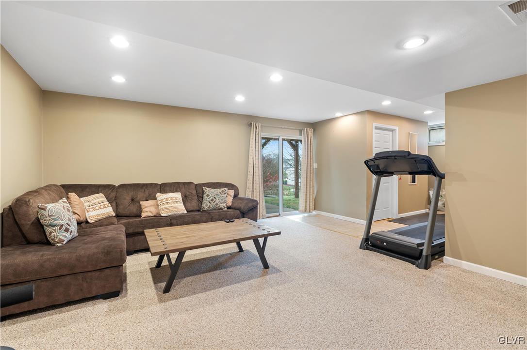 2229 Juniper Drive Coplay, PA 18037 - Photo 34 of 52 a living room with furniture and a rug