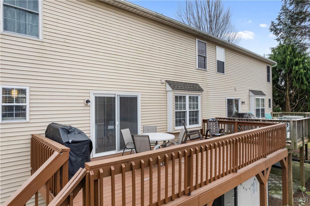 2229 Juniper Drive Coplay, PA 18037 - Photo 41 of 52 a view of a house with two chairs and a large tree