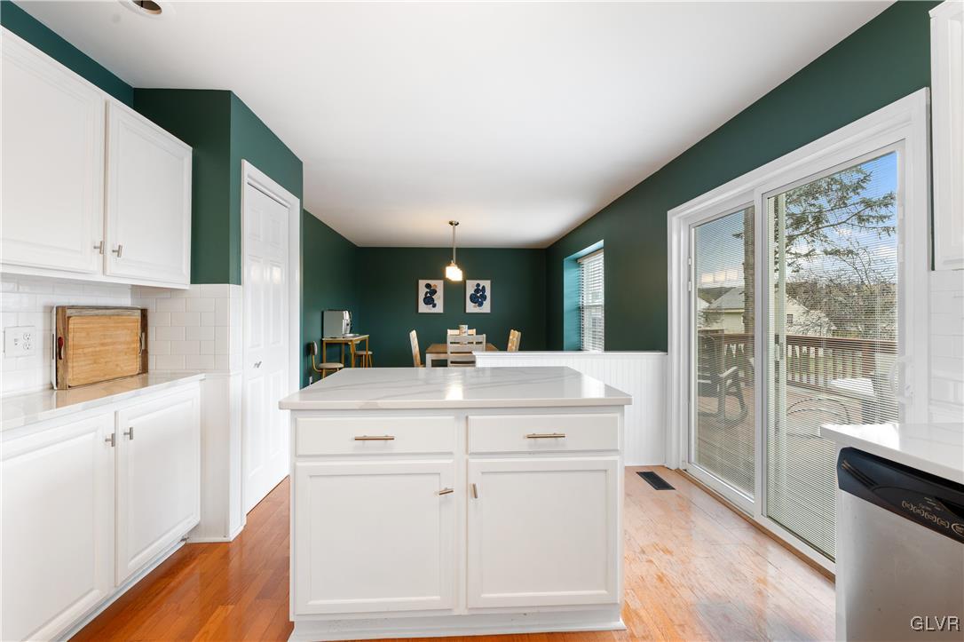 2229 Juniper Drive Coplay, PA 18037 - Photo 6 of 52 a kitchen with kitchen island a counter top space and a sink