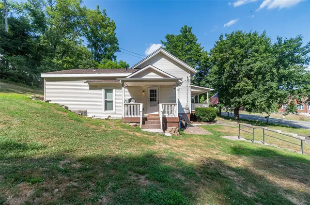 a view of a porch with a yard