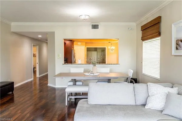a view of a livingroom with wooden floor
