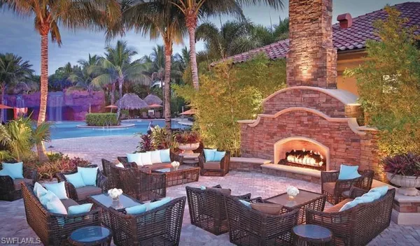 a view of a backyard with swimming pool