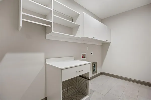 an aerial view of a house with backyard