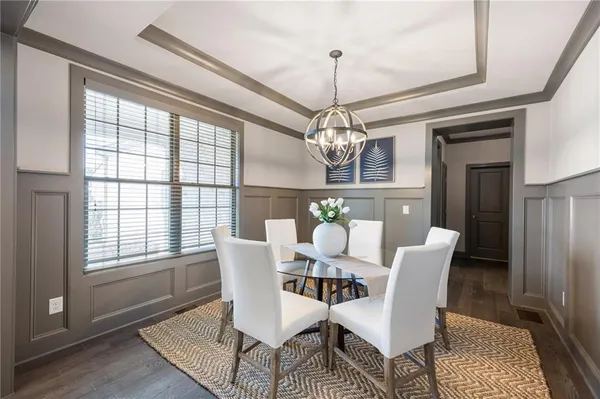 a kitchen with stainless steel appliances a sink stove and refrigerator