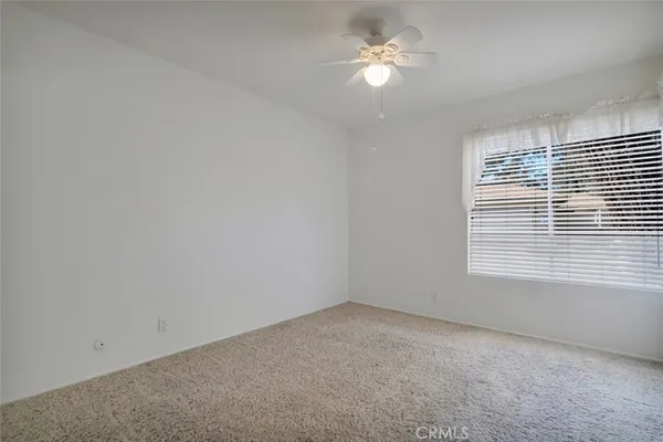 a view of empty room with a window