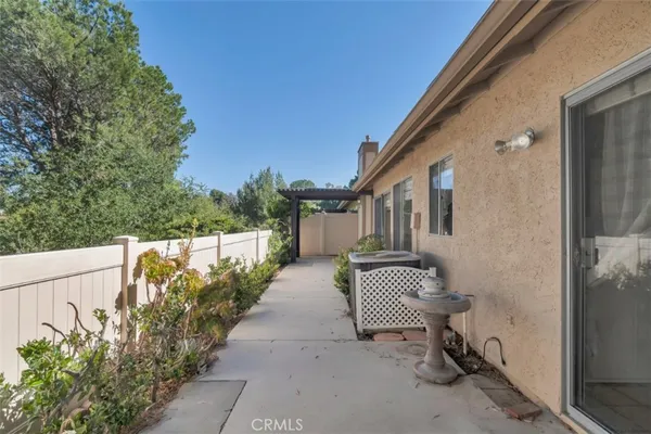 a view of a glass door with wooden floor
