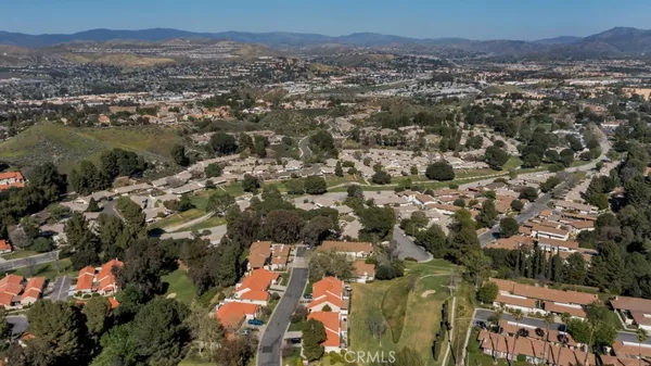 an aerial view of a city with lots of residential buildings