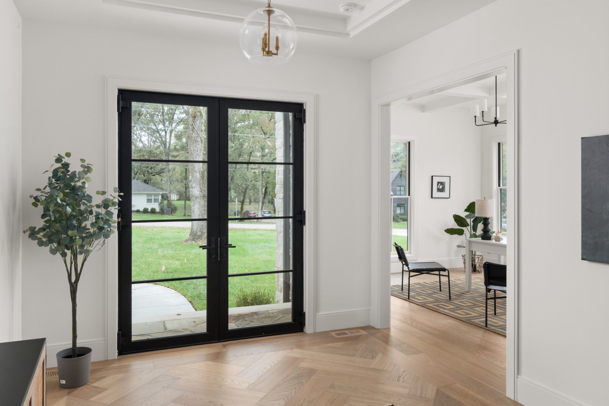 706 Brook Hollow Road Nashville, TN 37205 - Photo 13 of 55 a living room with furniture and a potted plant