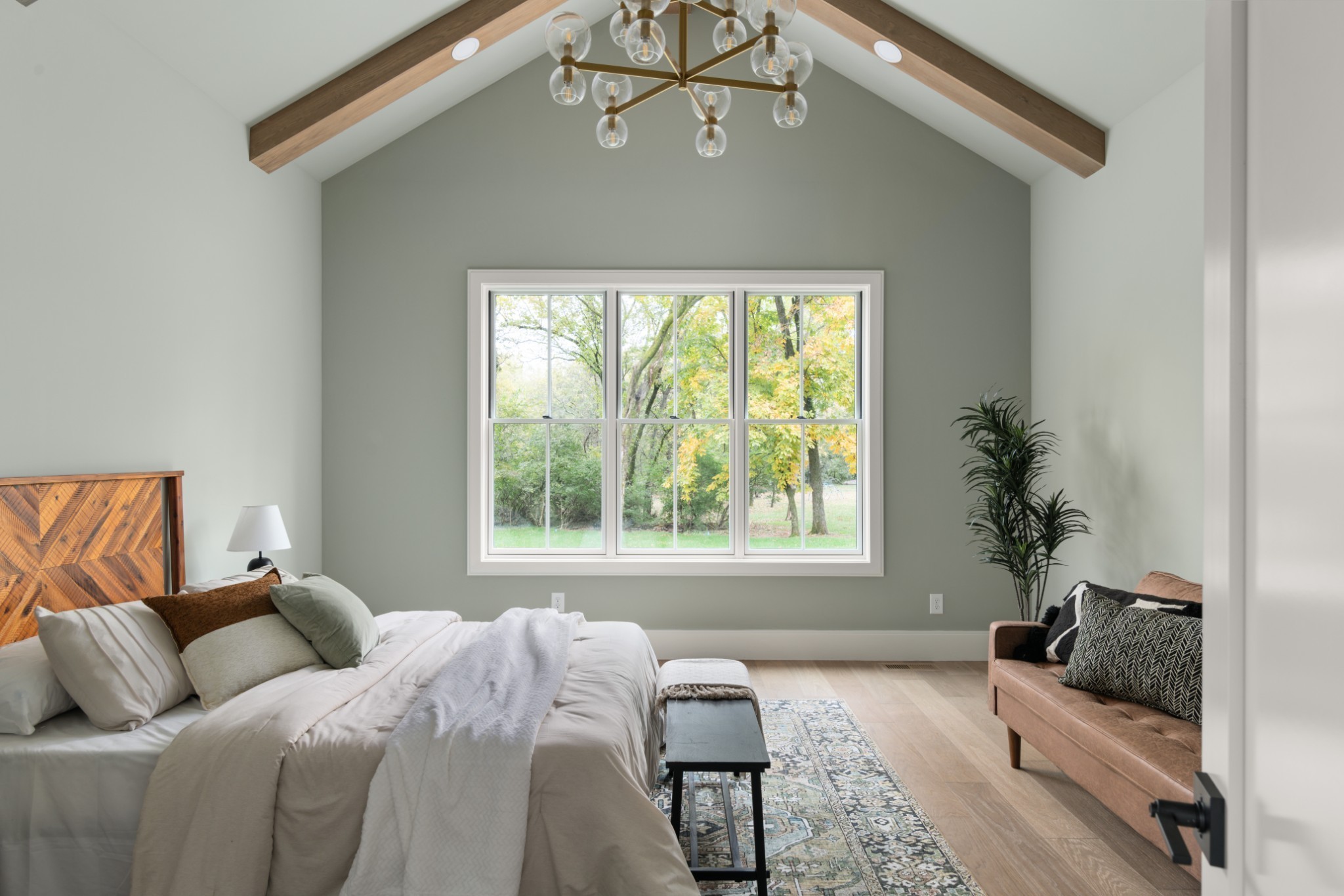 706 Brook Hollow Road Nashville, TN 37205 - Photo 29 of 55 a bed sitting in a bedroom next to a window