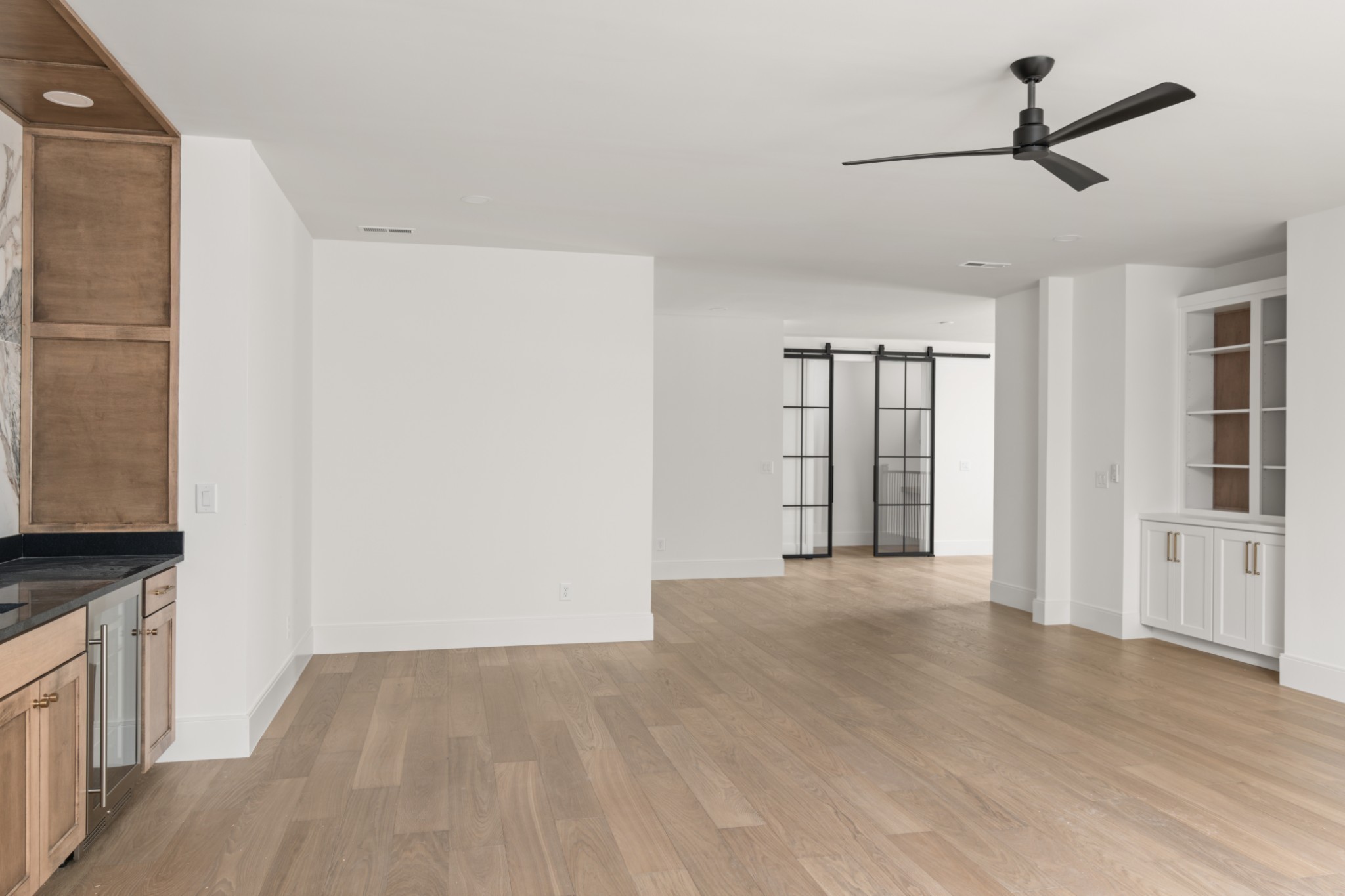 706 Brook Hollow Road Nashville, TN 37205 - Photo 37 of 55 a view of an empty room with window and wooden floor