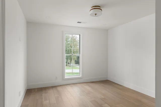 a bathroom with a bathtub and a toilet