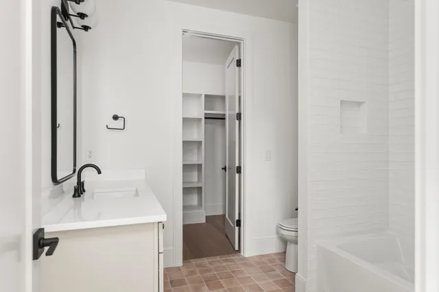 a view of house with yard