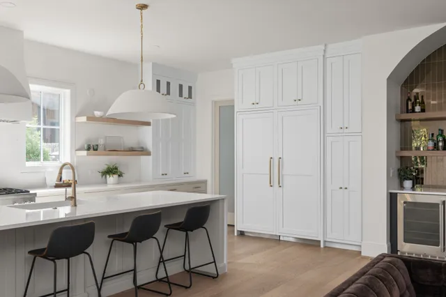 a view of a room with window and hardwood floor