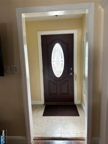 a view of a door of a house with a door
