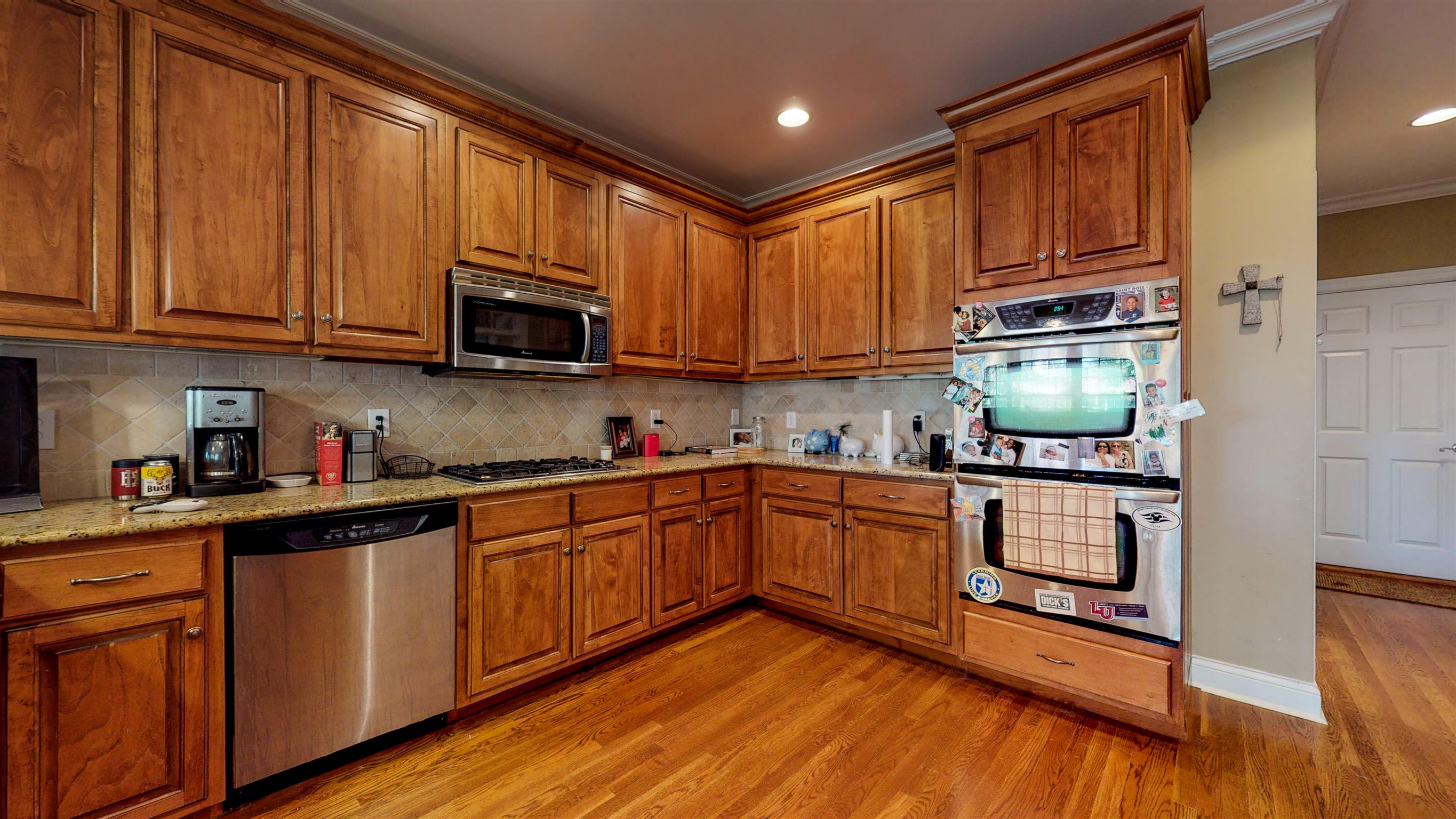 5344 Sherrington Road Murfreesboro, TN 37128 - Photo 7 of 24 Stainless steel appliances with double oven and gas range