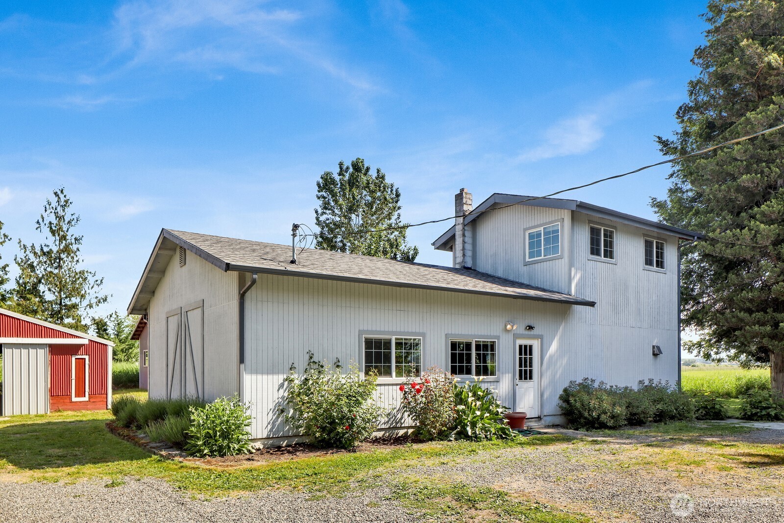 8172 Van Buren Road Everson, WA 98247 - Photo 26 of 33 a front view of a house with garden
