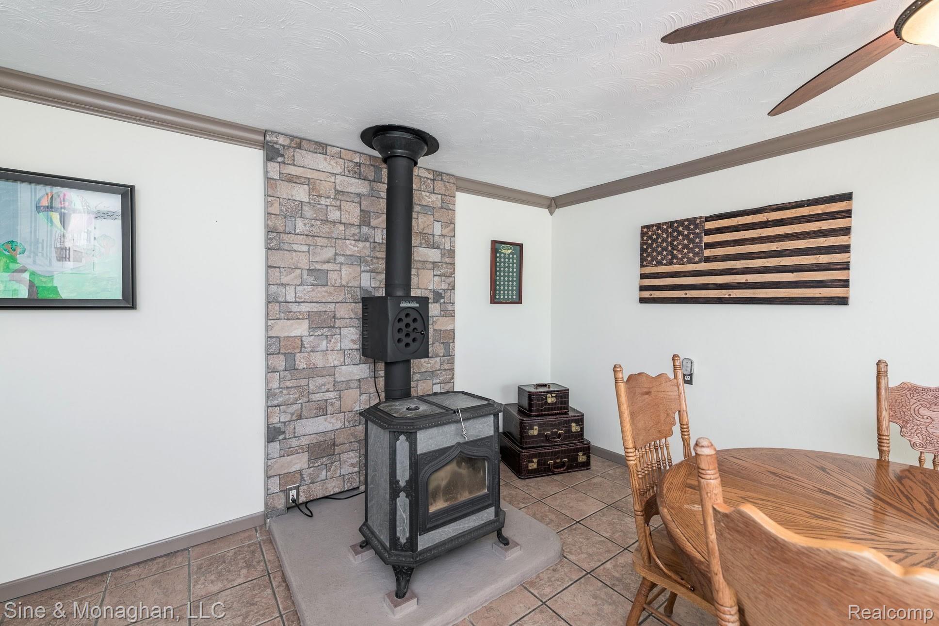 39716 Willow Road New Boston, MI 48164 - Photo 12 of 41 Wood stove