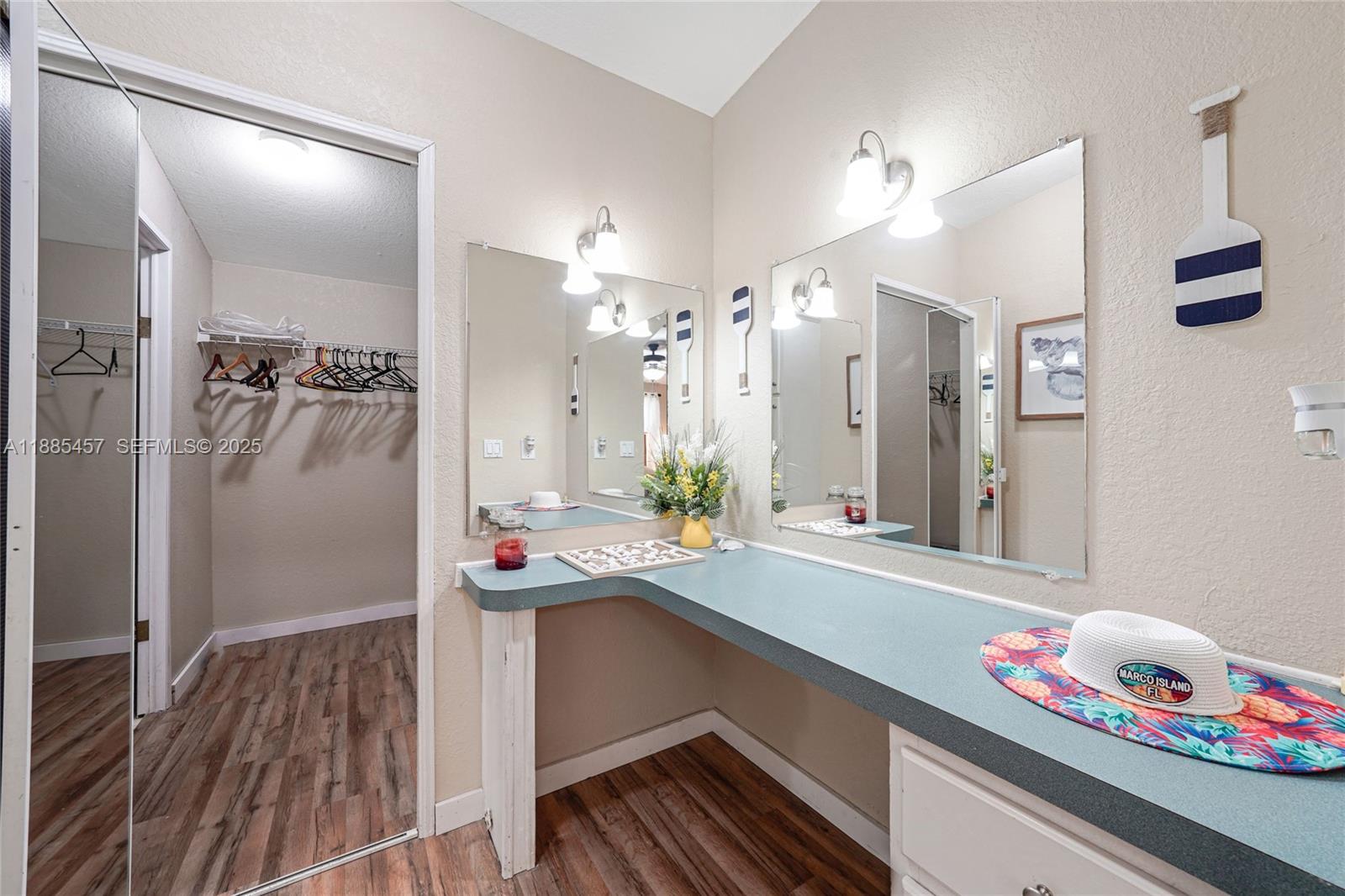 945 Plantation Road, Unit 945 Key Largo, FL 33037 - Photo 23 of 66 a bathroom with a sink and a mirror