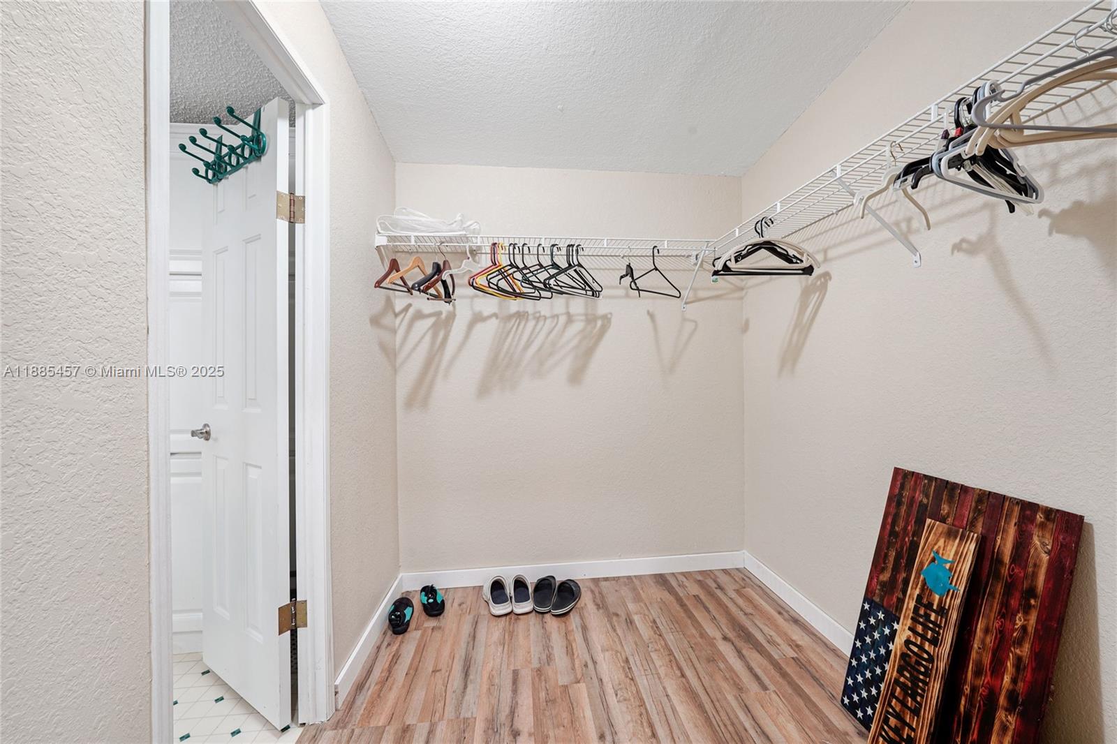945 Plantation Road, Unit 945 Key Largo, FL 33037 - Photo 25 of 66 a view of a hallway with wooden floor and staircase