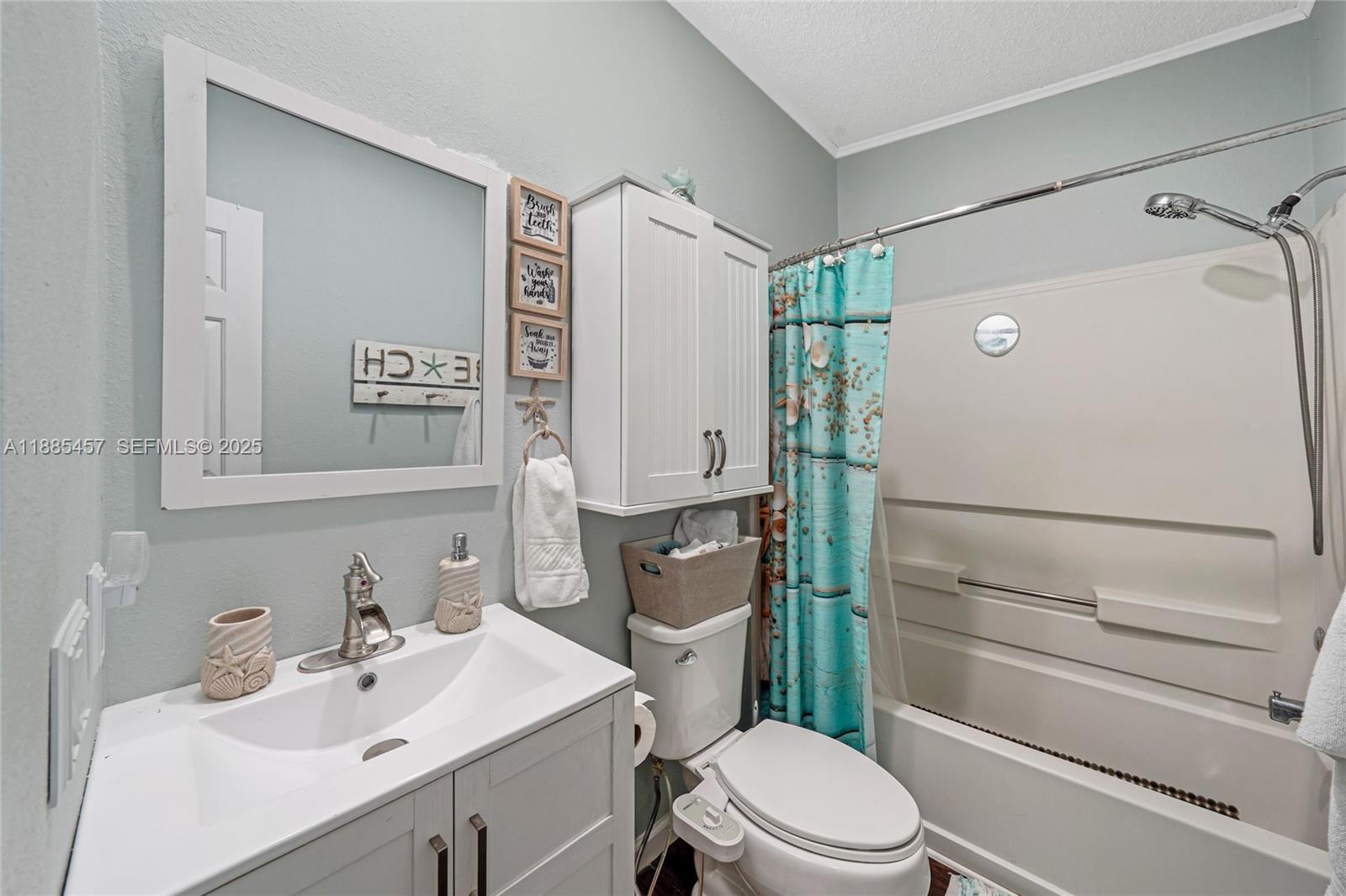 945 Plantation Road, Unit 945 Key Largo, FL 33037 - Photo 31 of 66 a bathroom with a sink toilet and shower