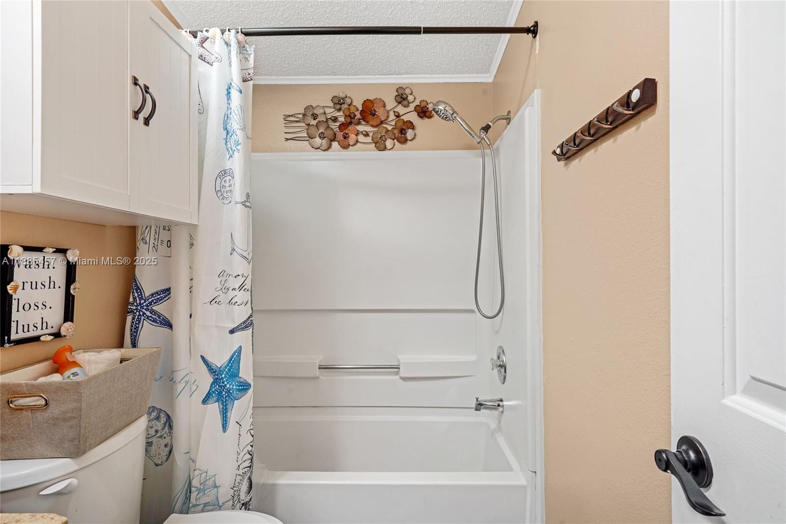 945 Plantation Road, Unit 945 Key Largo, FL 33037 - Photo 36 of 66 a bathroom with a shower and a tub