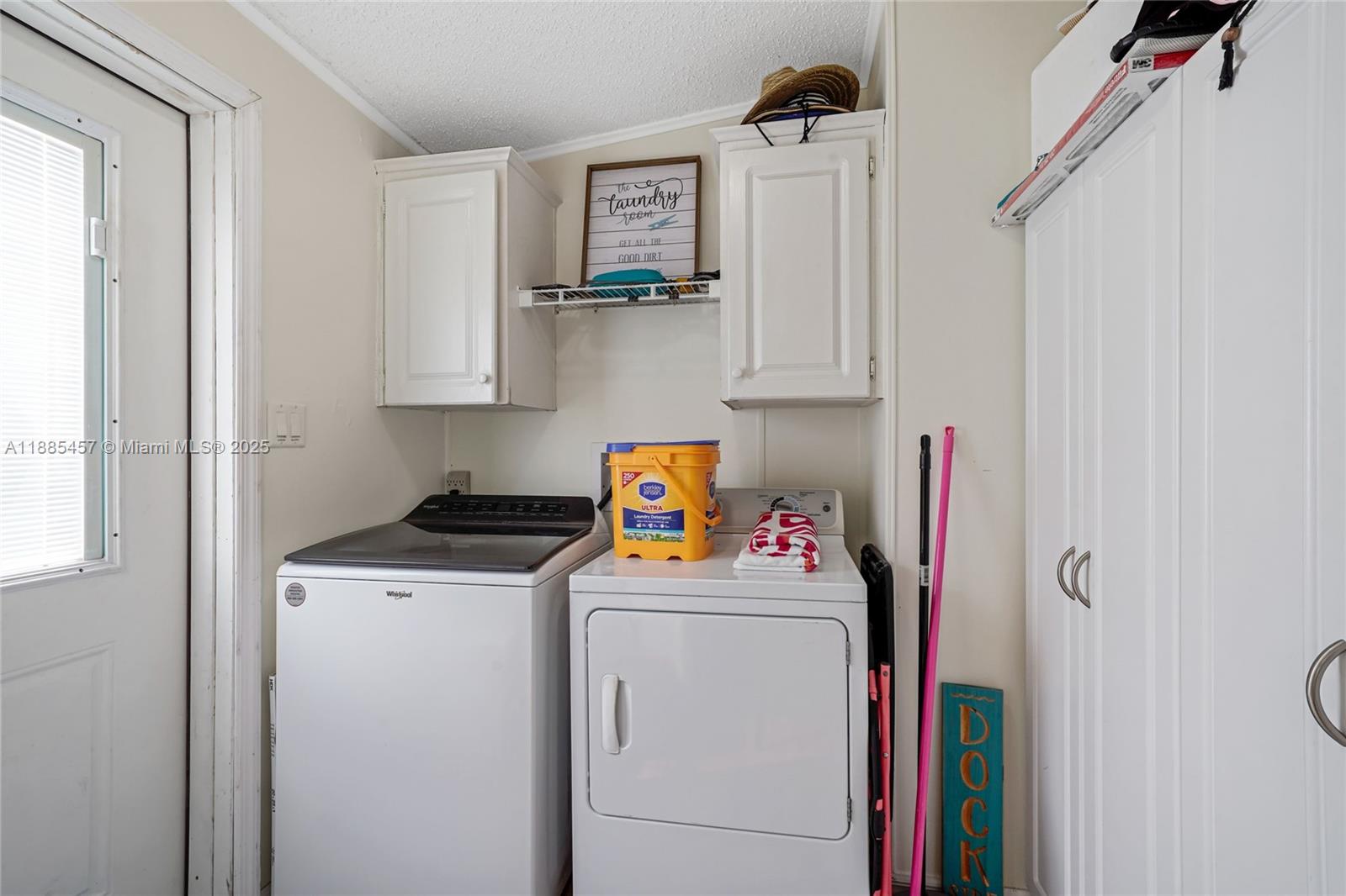 945 Plantation Road, Unit 945 Key Largo, FL 33037 - Photo 37 of 66 a utility room with dryer and washer
