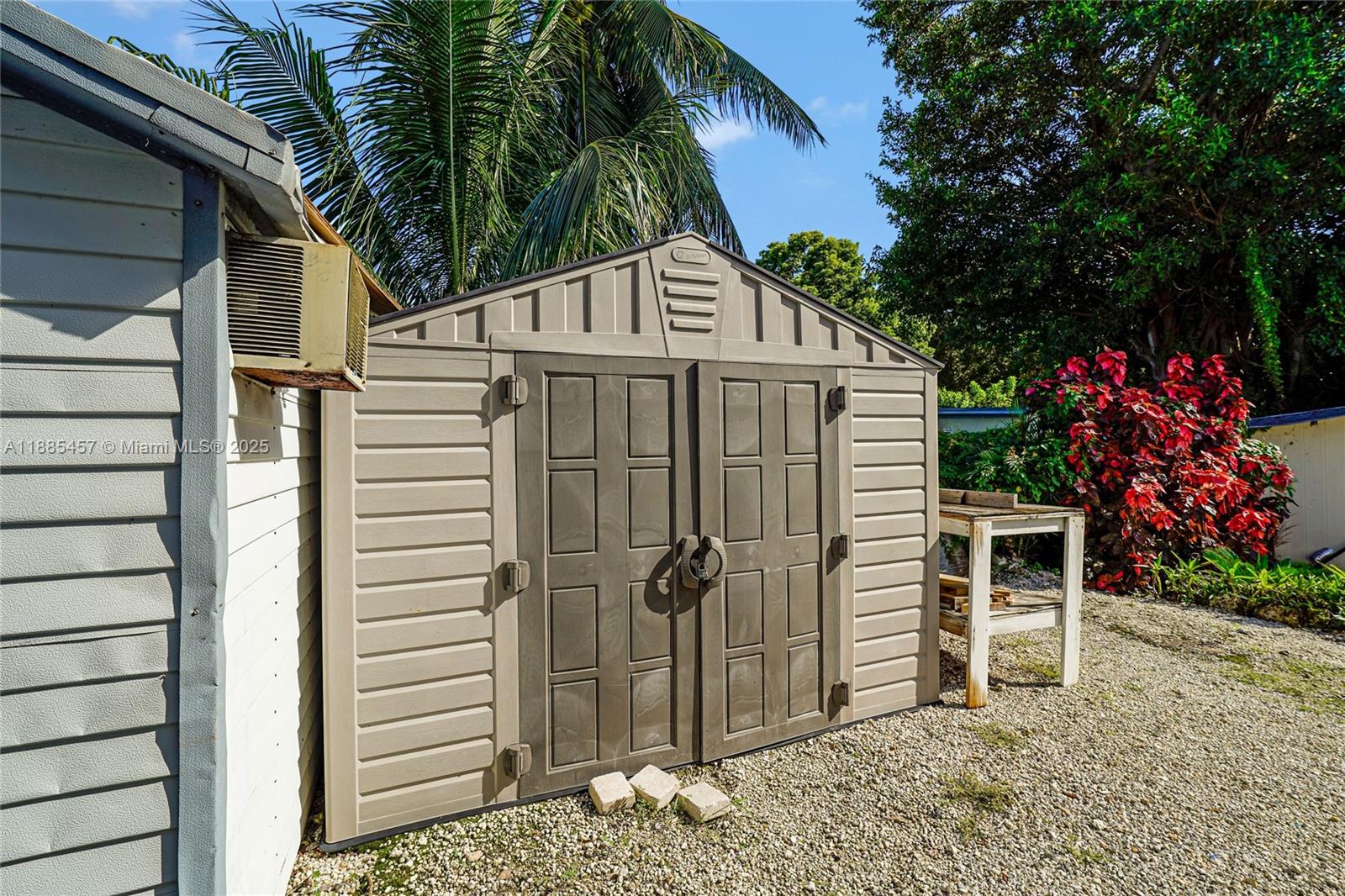 945 Plantation Road, Unit 945 Key Largo, FL 33037 - Photo 40 of 66 a view of a house with a yard