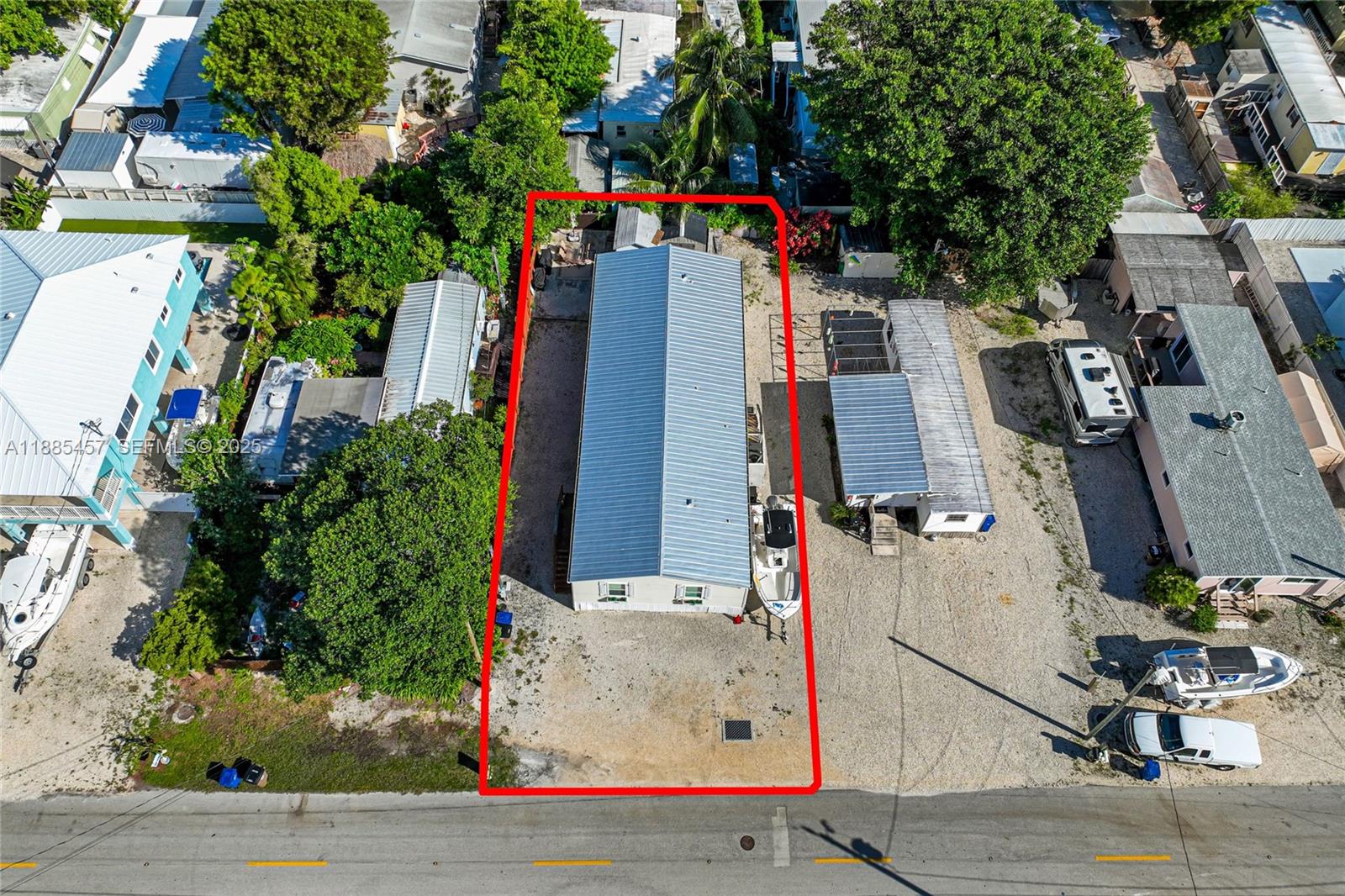 945 Plantation Road, Unit 945 Key Largo, FL 33037 - Photo 44 of 66 an aerial view of residential house with outdoor space