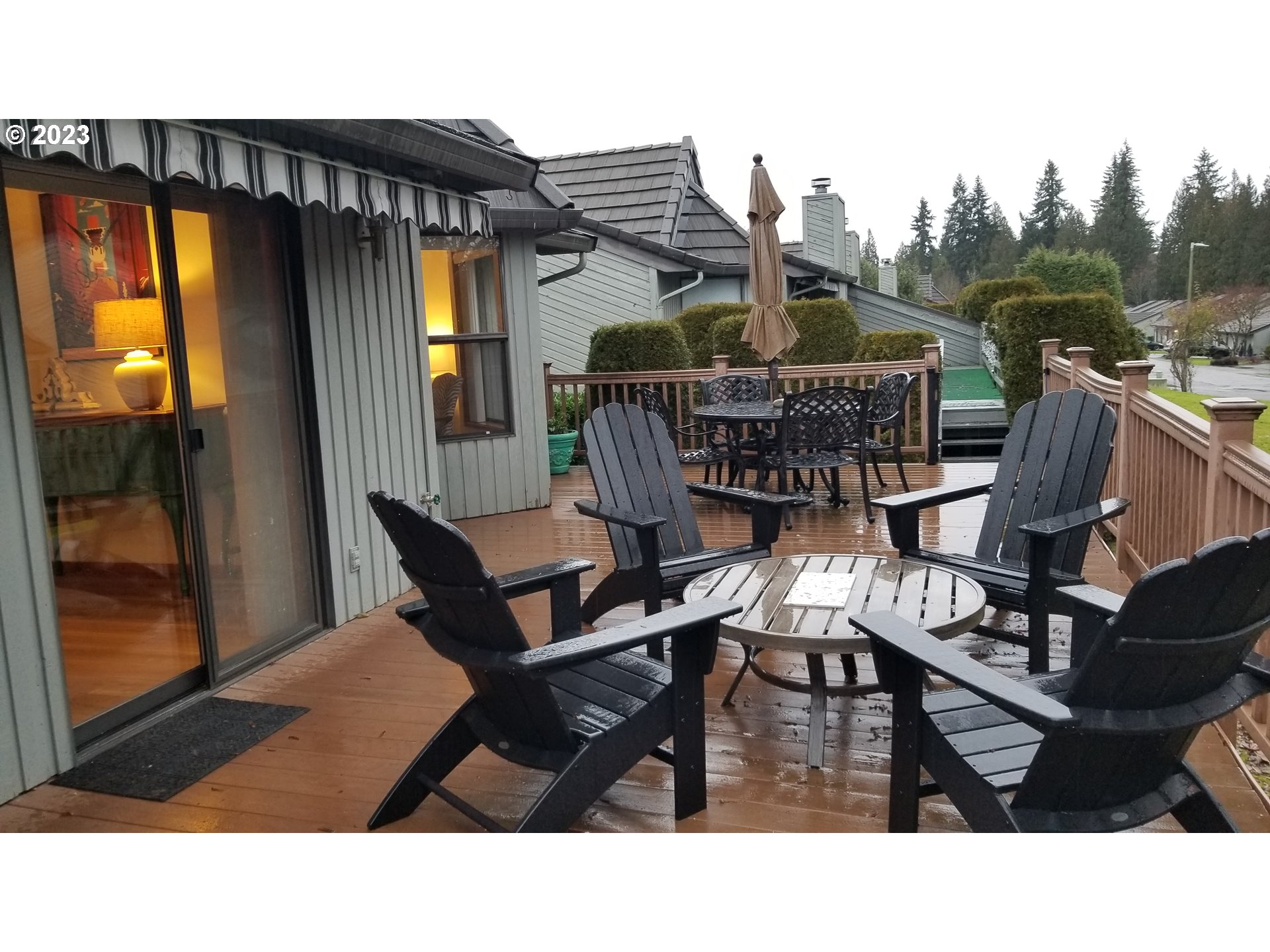3300 Northeast 164th Street, Unit D1 Ridgefield, WA 98642 - Photo 21 of 27 a balcony with table and chairs