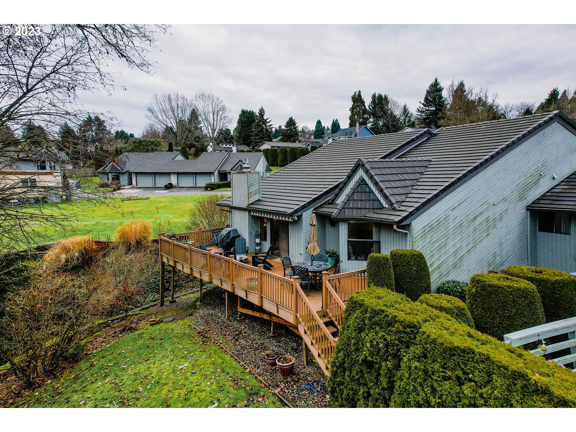 3300 Northeast 164th Street, Unit D1 Ridgefield, WA 98642 - Photo 23 of 27 a view of a house with pool and a yard
