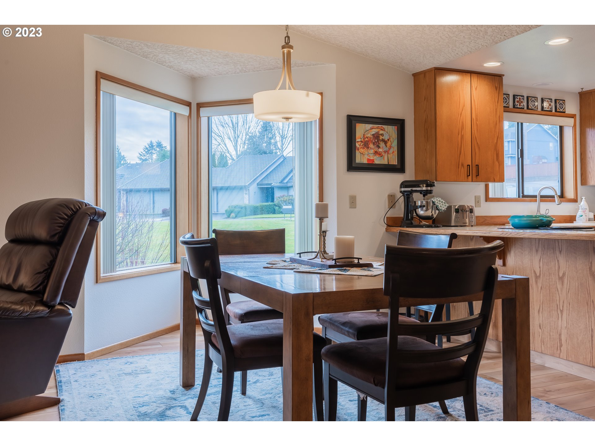 3300 Northeast 164th Street, Unit D1 Ridgefield, WA 98642 - Photo 10 of 27 a dining room with furniture and window