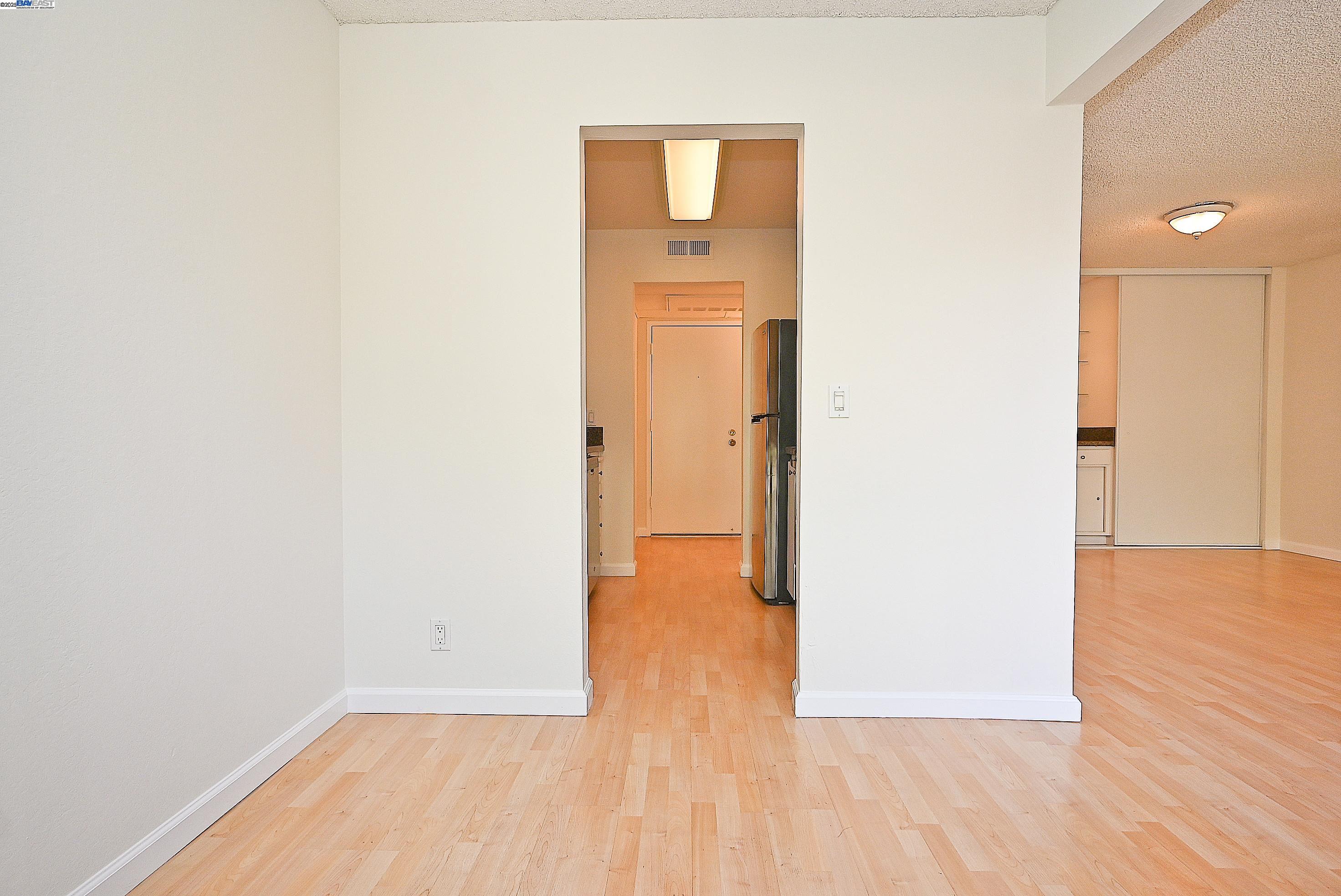320 North Civic Drive, Unit 307 Walnut Creek, CA 94596 - Photo 11 of 37 a view of a hallway with wooden floor
