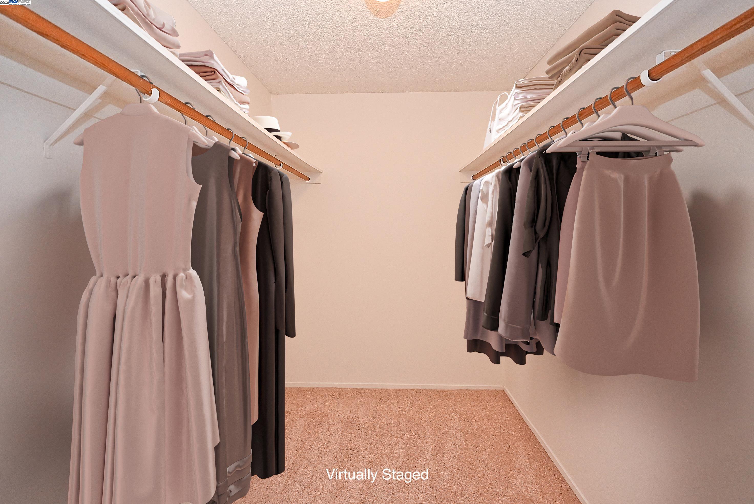 320 North Civic Drive, Unit 307 Walnut Creek, CA 94596 - Photo 19 of 37 a view of walk in closet with clothes