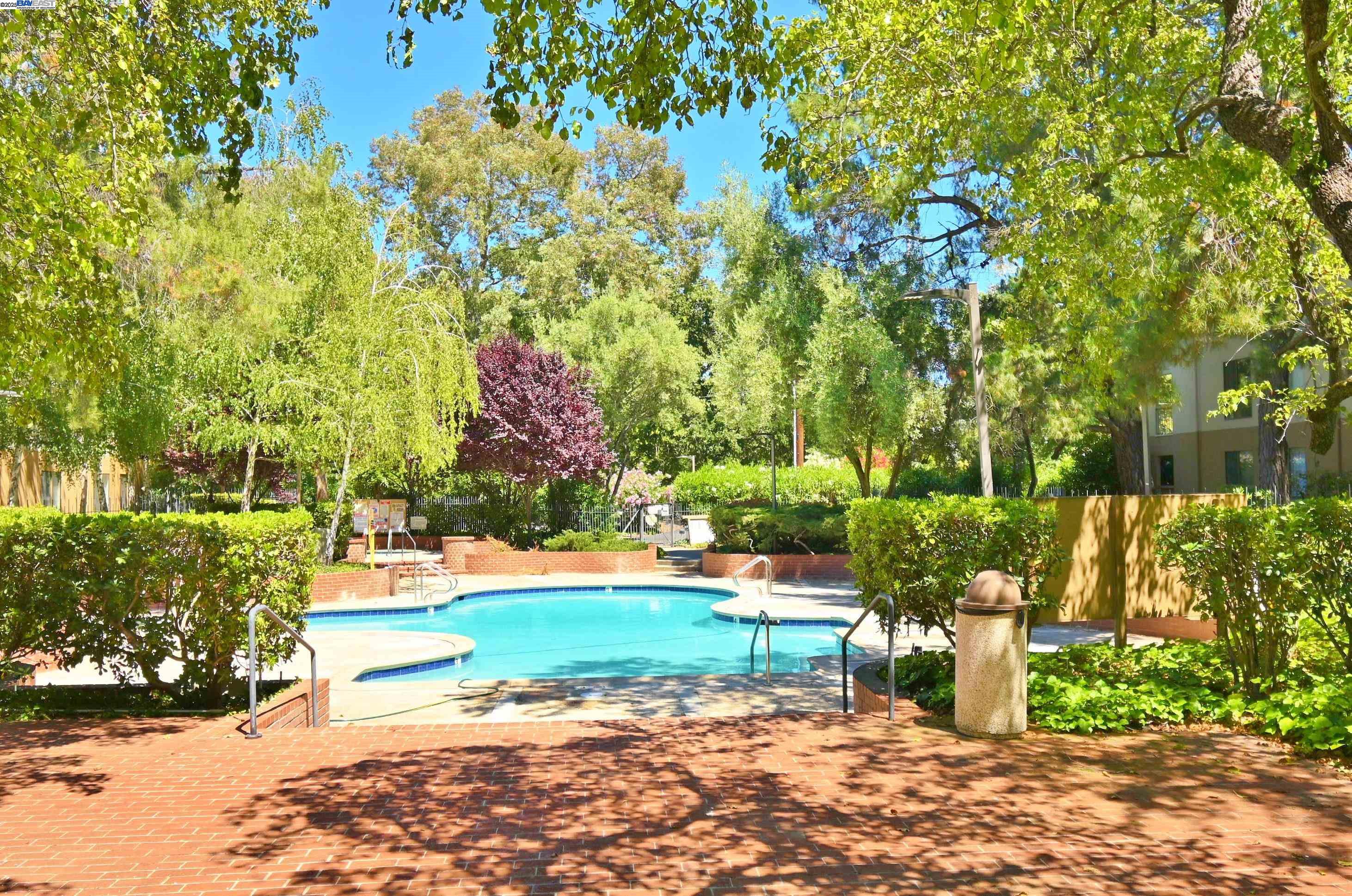 320 North Civic Drive, Unit 307 Walnut Creek, CA 94596 - Photo 29 of 37 a pathway of a house with a yard