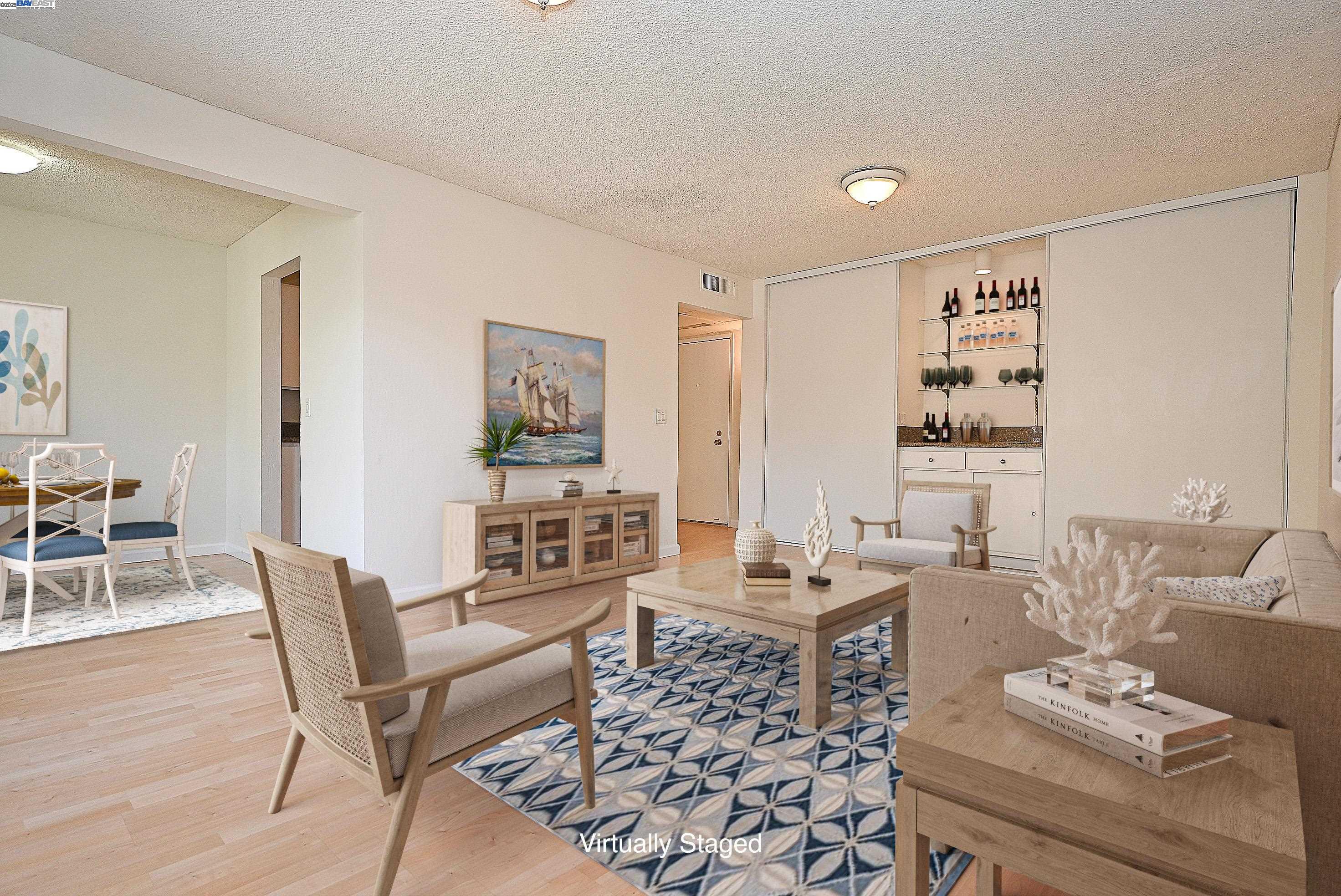 320 North Civic Drive, Unit 307 Walnut Creek, CA 94596 - Photo 4 of 37 a living room with furniture and wooden floor