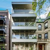 a front view of a building with retail shops