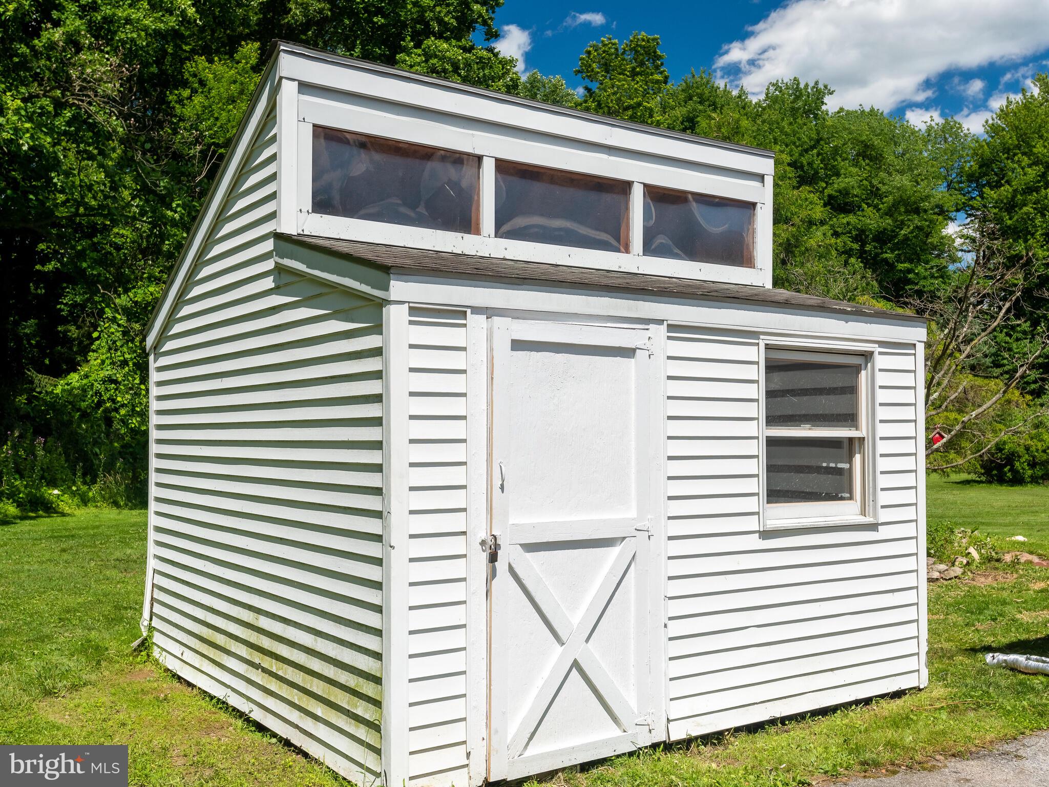 56 Andover Road Glenmoore, PA 19343 - Photo 2 of 35 Great Storage Shed to Side House Built in Shelves