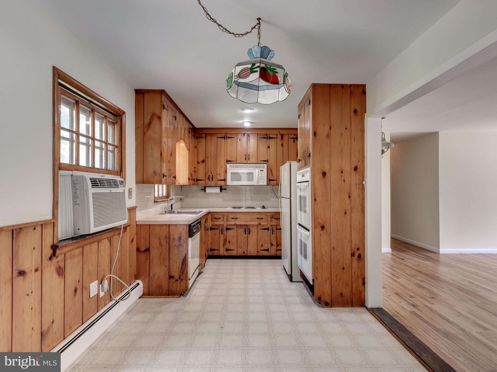 56 Andover Road Glenmoore, PA 19343 - Photo 20 of 35 Kitchen with Wall Air Conditioner