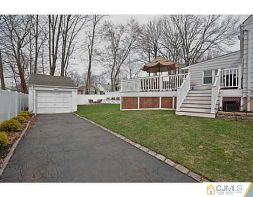 110 Highfield Road Colonia, NJ 07067 - Photo 21 of 23 a view of a house with a yard