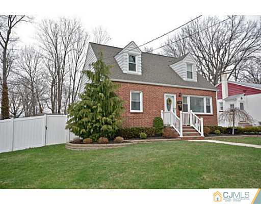 110 Highfield Road Colonia, NJ 07067 - Photo 23 of 23 a front view of a house with a yard
