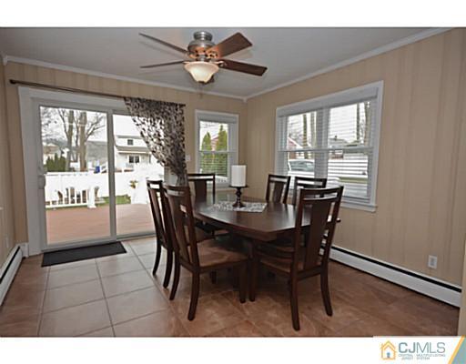 110 Highfield Road Colonia, NJ 07067 - Photo 5 of 23 a view of a dining room with furniture window and outside view