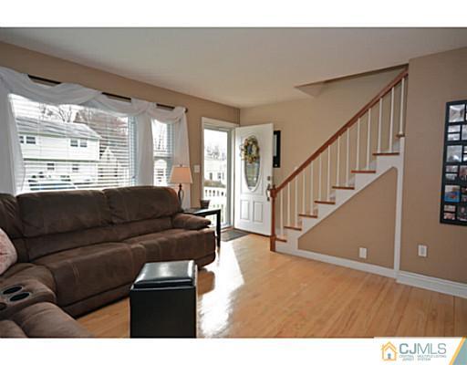 110 Highfield Road Colonia, NJ 07067 - Photo 9 of 23 a living room with furniture and a window