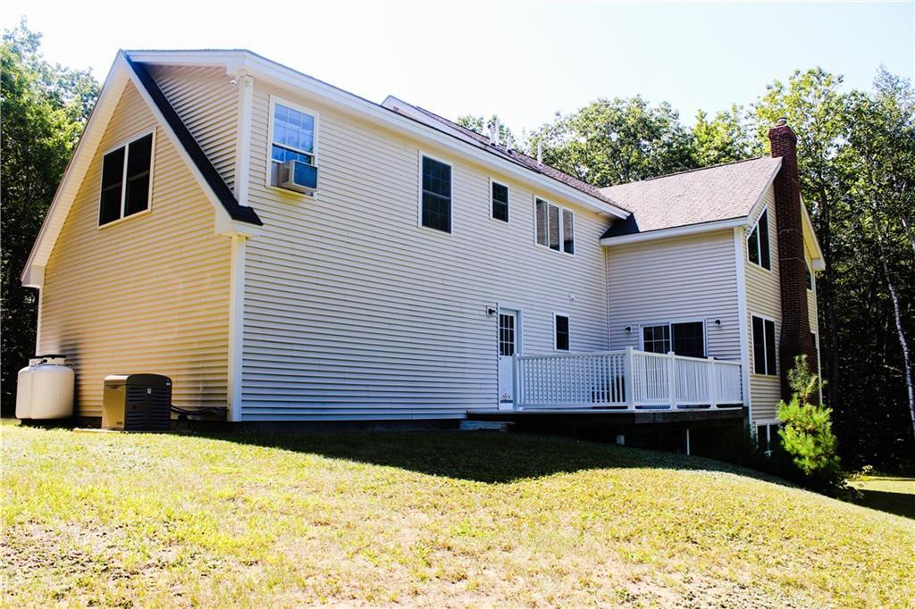 146 Valley Road Raymond, ME 04071 - Photo 4 of 35 Side view of home. Home has whole...