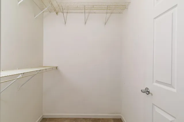 a view of a room with racks on the wall