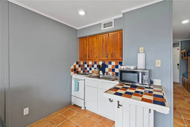 a room with furniture and a flat screen tv