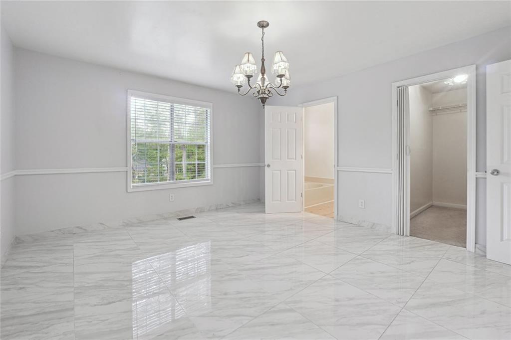 3149 Lakeview Parkway Villa Rica, GA 30180 - Photo 20 of 29 a view of an empty room with a window