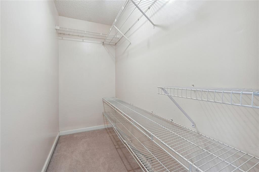 3149 Lakeview Parkway Villa Rica, GA 30180 - Photo 21 of 29 a view of a room with racks on the wall