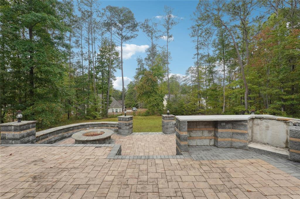 3149 Lakeview Parkway Villa Rica, GA 30180 - Photo 26 of 29 a view of backyard with swimming pool and seating space