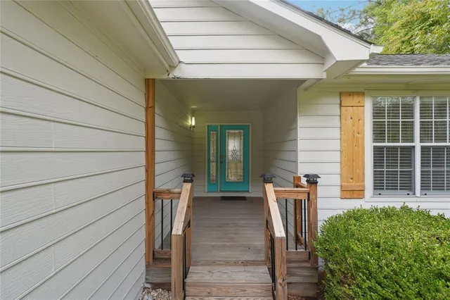 a view of outdoor space deck and tree